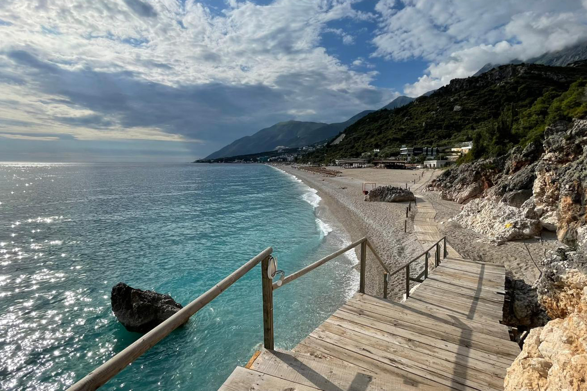Dhërmi beach with crystal-clear blue waters on the Albanian Riviera