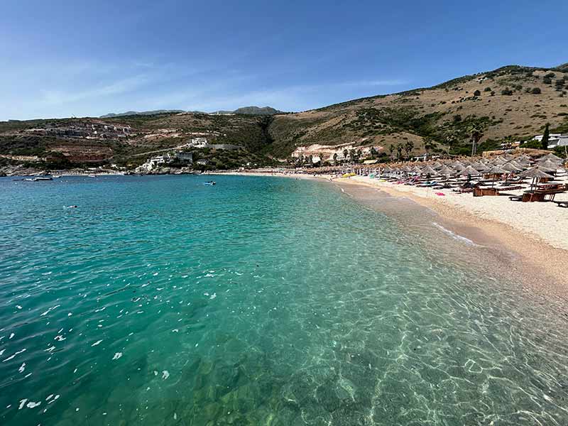 Albanian Riviera coastline with mountains and blue sea near Himarë, Albania