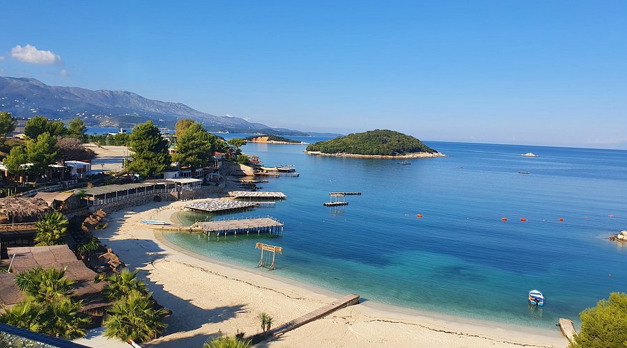 Ksamil beaches with turquoise water and islands close to the shore in southern Albania