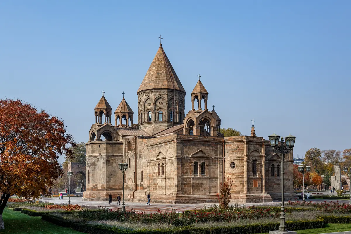 Echmiadzin Cathedral with its dark stone facade and historic bell tower, Vagharshapat, Armenia