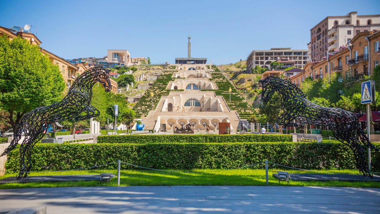 Cascade Complex with the large pink stone staircase and sculptures in the garden, Yerevan, Armenia