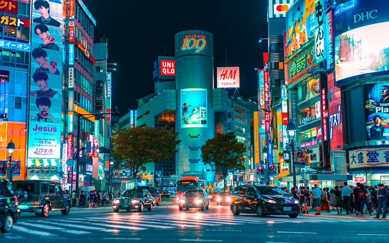 Shibuya Crossing with crowds of pedestrians in Tokyo