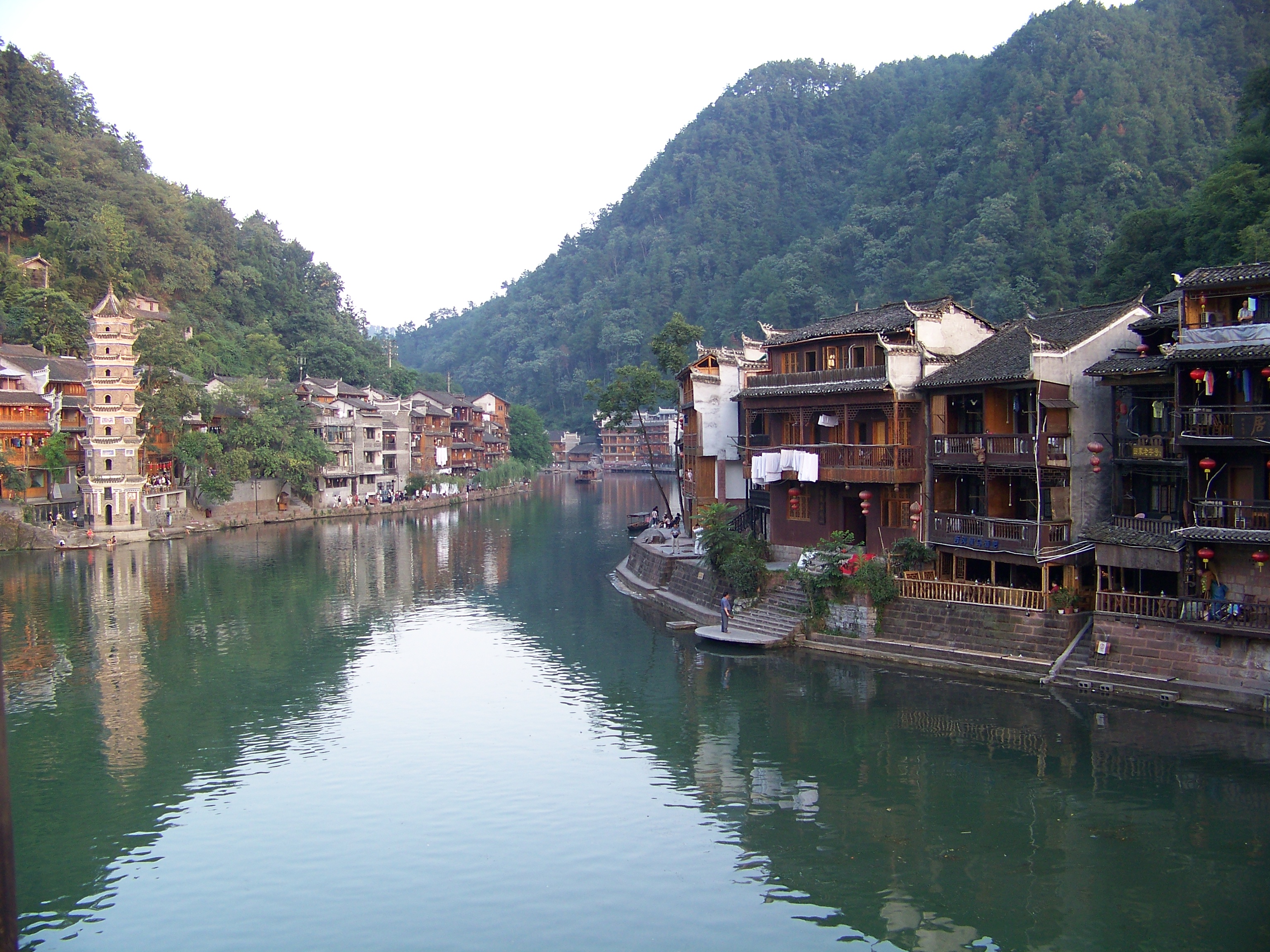 Tuojiang river with historic buildings and pagoda tower on the banks of Fenghuang Ancient Town, Hunan