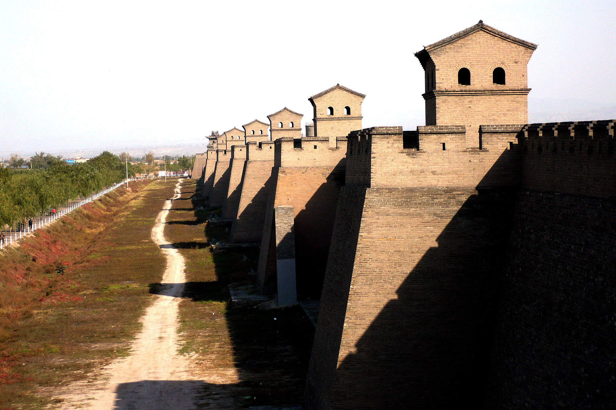 Pingyao Ancient City wall with watchtowers seen diagonally in Shanxi, China