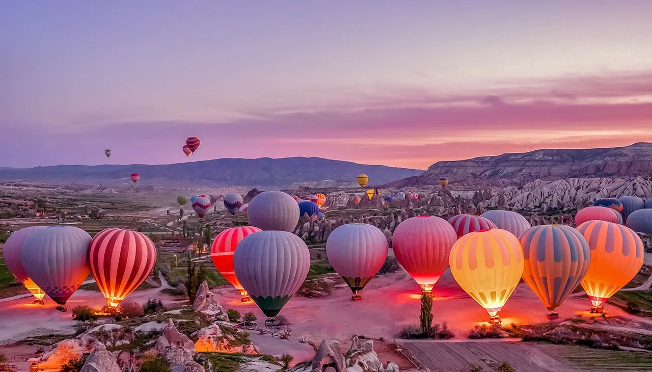 Hot-air balloons at sunrise in Cappadocia